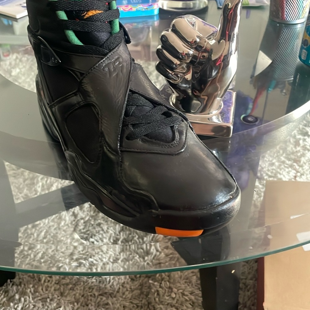 Jordan Black High-Top Sneakers with Orange Accent